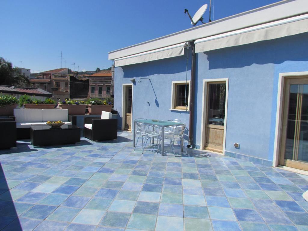 Loft con terrazza vista mare Aci Castello